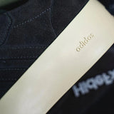 N372O FEAR OF GOD x ADIDAS ‘86 FORUM MID “BLACK”