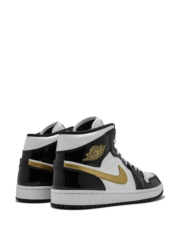 N373O Jordan 1 Mid Patent en negro, blanco y dorado