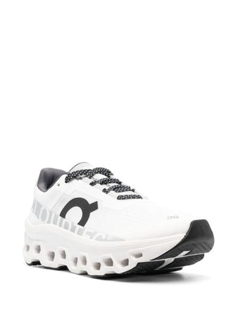 On Running tenis Cloudmonster blanco negro