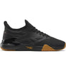Reebok Nano Court en color negro con detalles dorados.