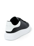 N370O (G5) Alexander McQueen tenis bajos Oversized Negro blanco